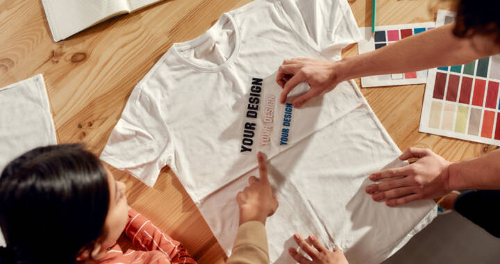 Team works on a custom-branded T-shirt